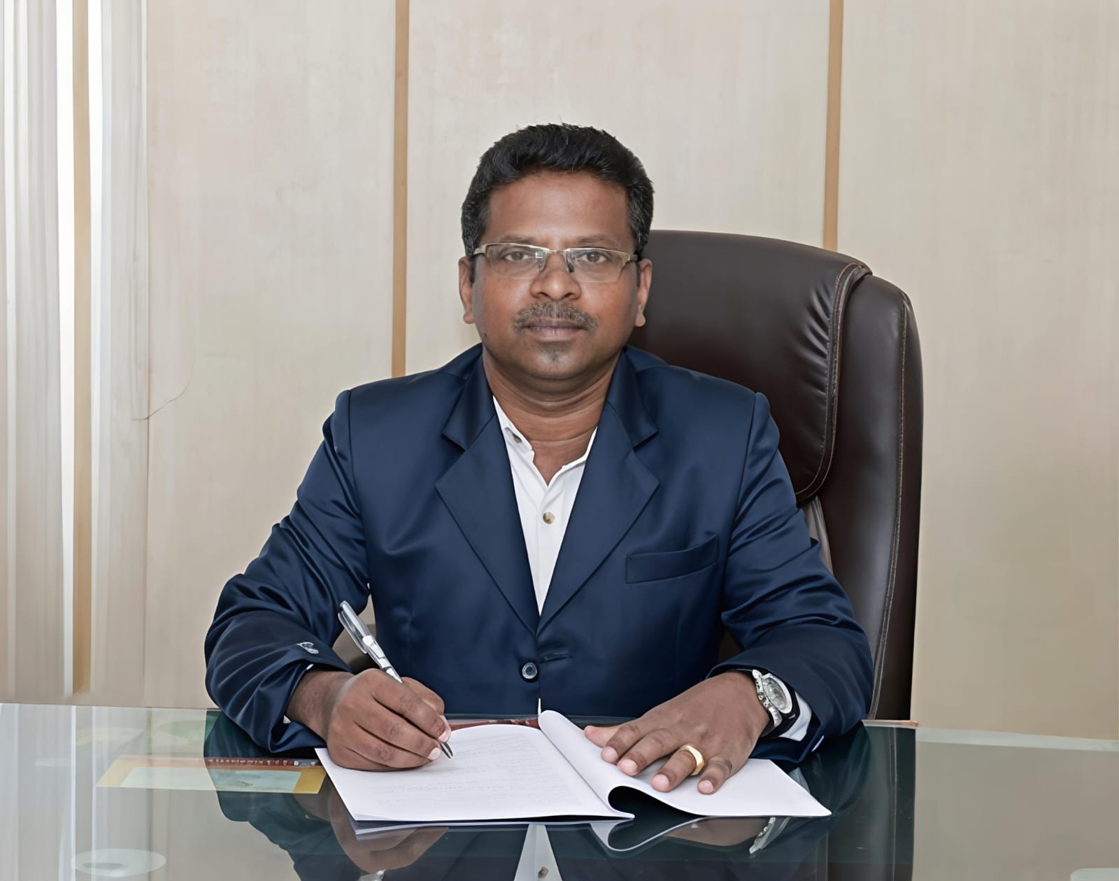Principal Dr. N.M. Spencer Prathap Singh